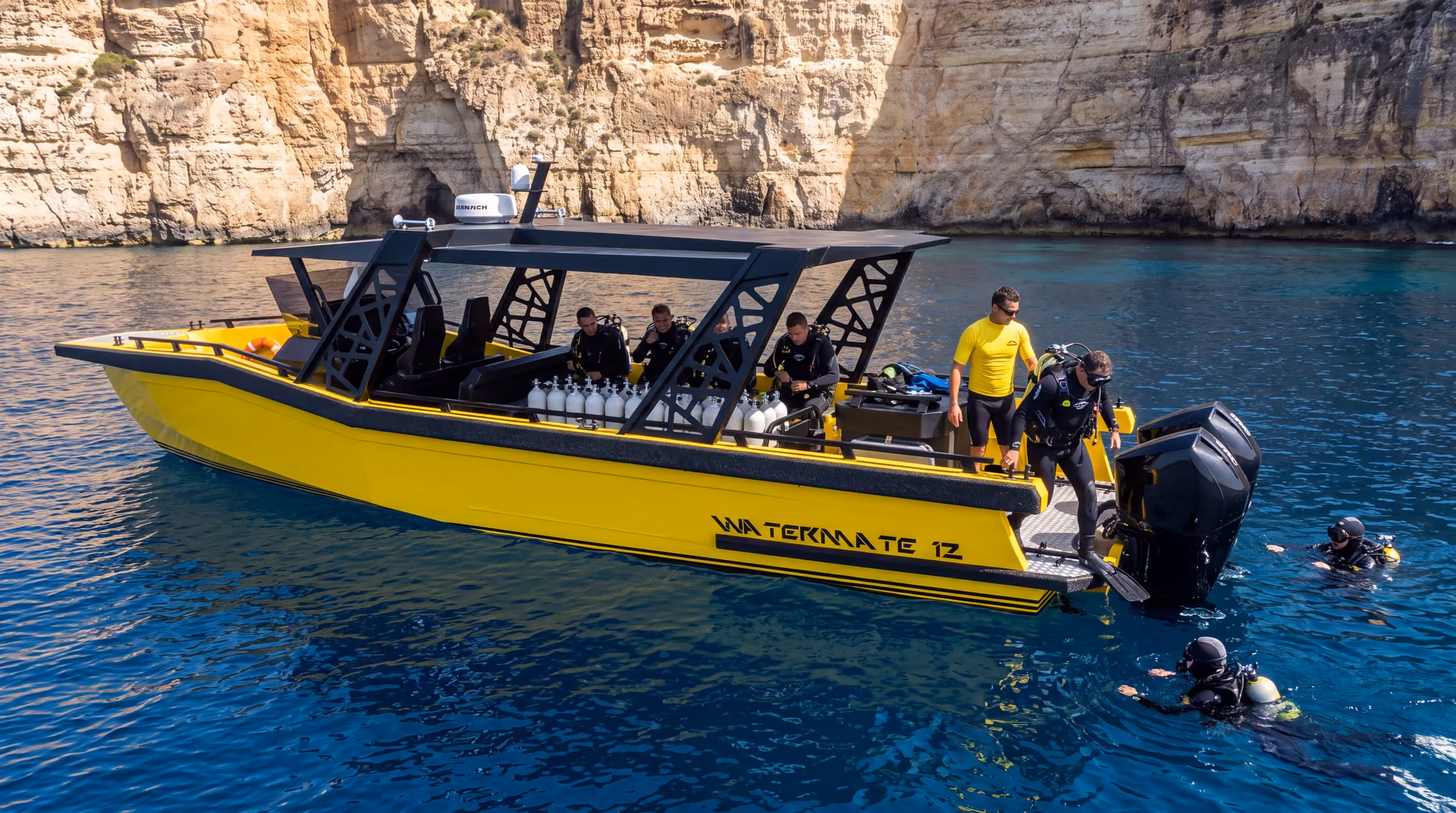 AI concept render of the AO12 Safari passenger boat at anchor in its hardtop diver configuration, the cylinder racks down the centre of the deck and divers in the water alongside